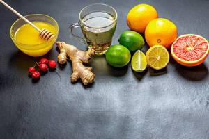 Ingredients for making immunity boosting natural drink-lemons, oranges, ginger, honey, grapefruit, lime, honey and rose hips (Flip 2019)