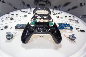 Inner workings of Elite 2 Series game controller, disassembled into individual parts