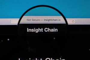 Insight Chain logo under magnifying glass