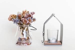 Interior. Decorative dry flowers and candle holder