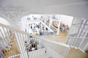 Interior view of modern bookshop with stairs