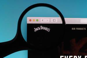 Jack Daniels logo under magnifying glass