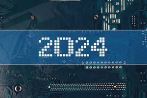 Jahreszahl 2024 vor einer elektronischen Leiterplatte als Hintergrund