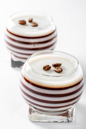 Jelly with white and black layers with coffee beans