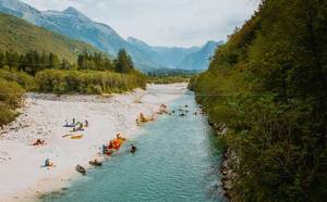 Kayaks on river Soca in Bovec