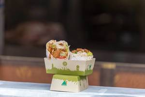 Kebab in tortillas offered in compostable paper plates at Tomorrowland festival