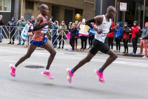 Kenyan athlete Dickson Chumba and a pacer running the Chicago Marathon 2019. Chumba won the Chicago Marathon in 2015 and was 7th this year