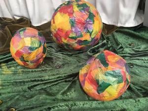 Kids craft work: lanterns covered with colorful paper