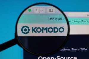 Komodo logo under magnifying glass