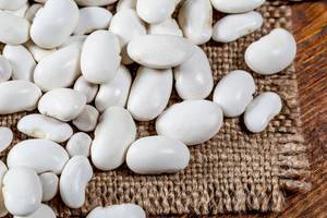 Large white beans on burlap
