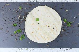 Lebanese pita with peppercorn and parsley