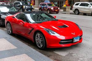 Legendary sports car: Red Corvette parked in Downtown Chicago