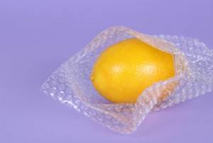 Lemon packed in bubble wrap