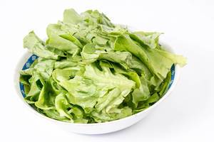 Lettuce Salad in the bowl above white background (Flip 2019)