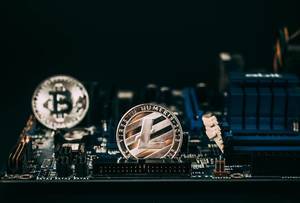 Litecoin and Bitcoin on motherboard