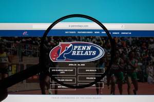 Lupe über dem Logo und Schriftzug der Penn Relays