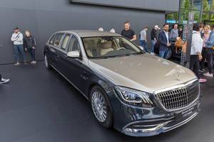Luxurious car and luxury limousine Mercedes-Maybach S650 Pullman, 21-foot long, redesigned grille & triple-band LED daytime