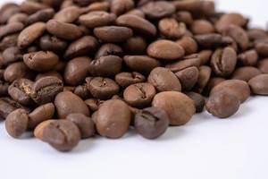 Macro fo Raw Coffee Beans on the white background (Flip 2019)