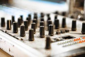 Macro shot of audio mixer knobs