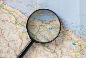 Magnifying glass on map