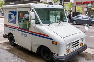 Mail truck of the US postal service in Downtown Chicago