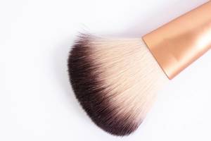 Makeup Brush above white background