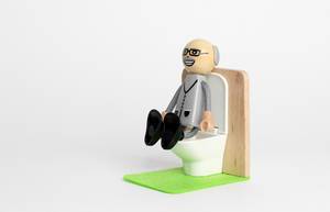 Man sitting on the toilet