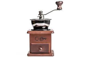 Manual coffee grinder for grinding coffee beans on white background