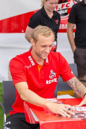 Marcel Risse giving autographs at 2018/2019 season opening