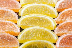 Marmalade in shape of citrus fruits wedges
