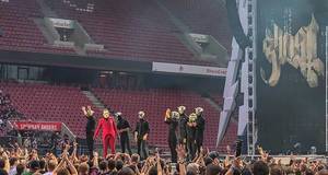 Masked members of the Swedish rock band Ghost, on stage at the RheinEnergie Stadium in Cologne, Germany