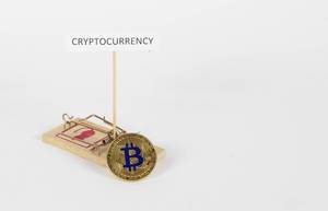 Mausefalle mit Bitcoin Münze als Köder