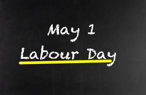 May 1 Labour day written on blackboard