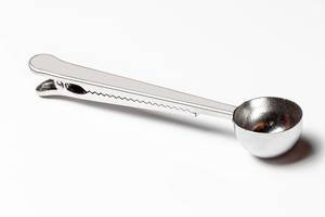 Measured coffee spoon on a white background (Flip 2020)