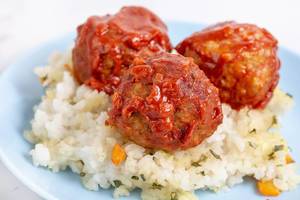 Meatballs with Tomato Sauce on the Risotto