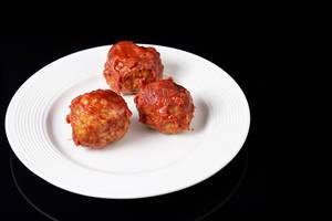 Meatballs with Tomato Sauce on the white plate (Flip 2019)