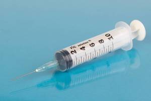 Medical syringe close up