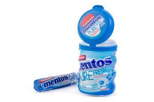 Mentos Chewing Gums plastic box above white background