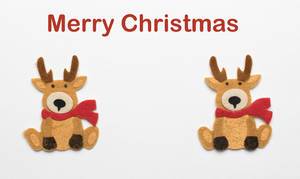 Merry Christmas message with two reindeers