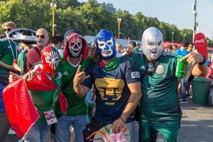 Mexican soccer fans wearing masks