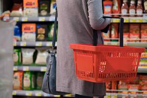 Midsection of Woman in Supermarket