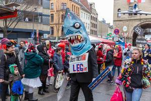 Miethai: Man in shark costume at Cologne carnival