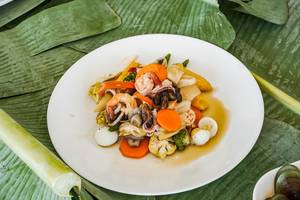 Mixed seafood dish on banana leaves