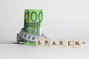Money shortage concept with German word Sparen