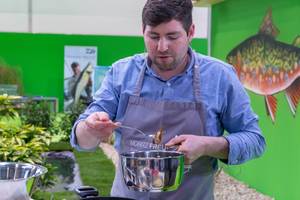 Moritz Freudenthal of kochen mit freude prepares meal in show kitchen