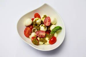 Mozarella with pesto and cherry tomatoes