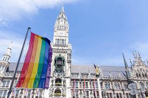 Munich celebrates Christopher Street Day to demonstrate for LGBTQ rights and raises rainbow flag in front of "Neues Rathaus" at Marienplatz