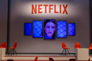 Netflix Tv Show presentation on several screens at the Gamescom in Cologne, Germany