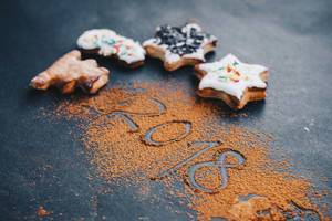 New year, new beginnings symbolised by christmas cookies and the year