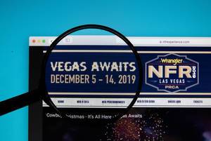 NFR Experience website on a computer screen with a magnifying glass